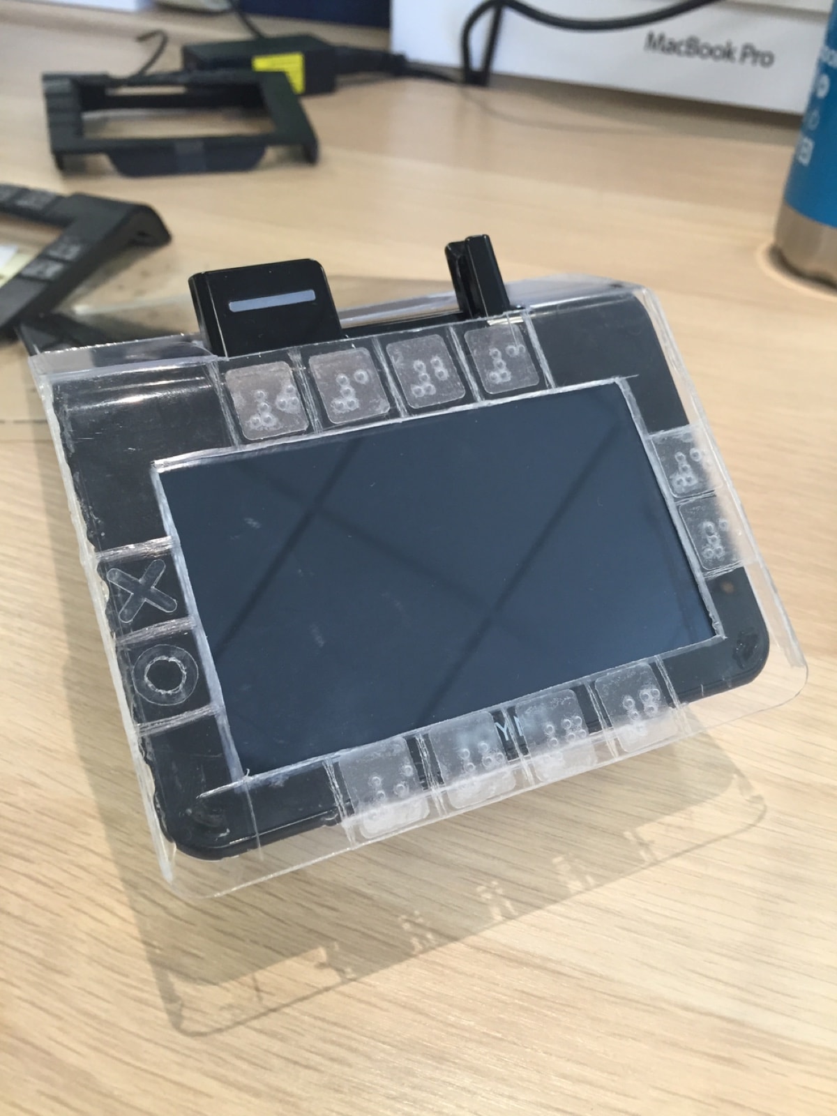 A clear acrylic version of the frame fitted to the terminal